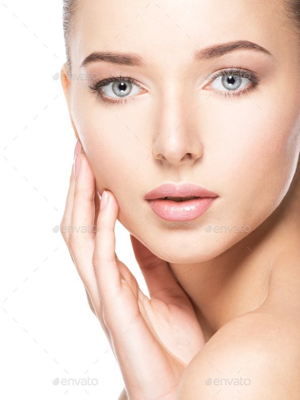 Young Woman With Healthy Clean Skin Touches The Face Skin Care Stock 